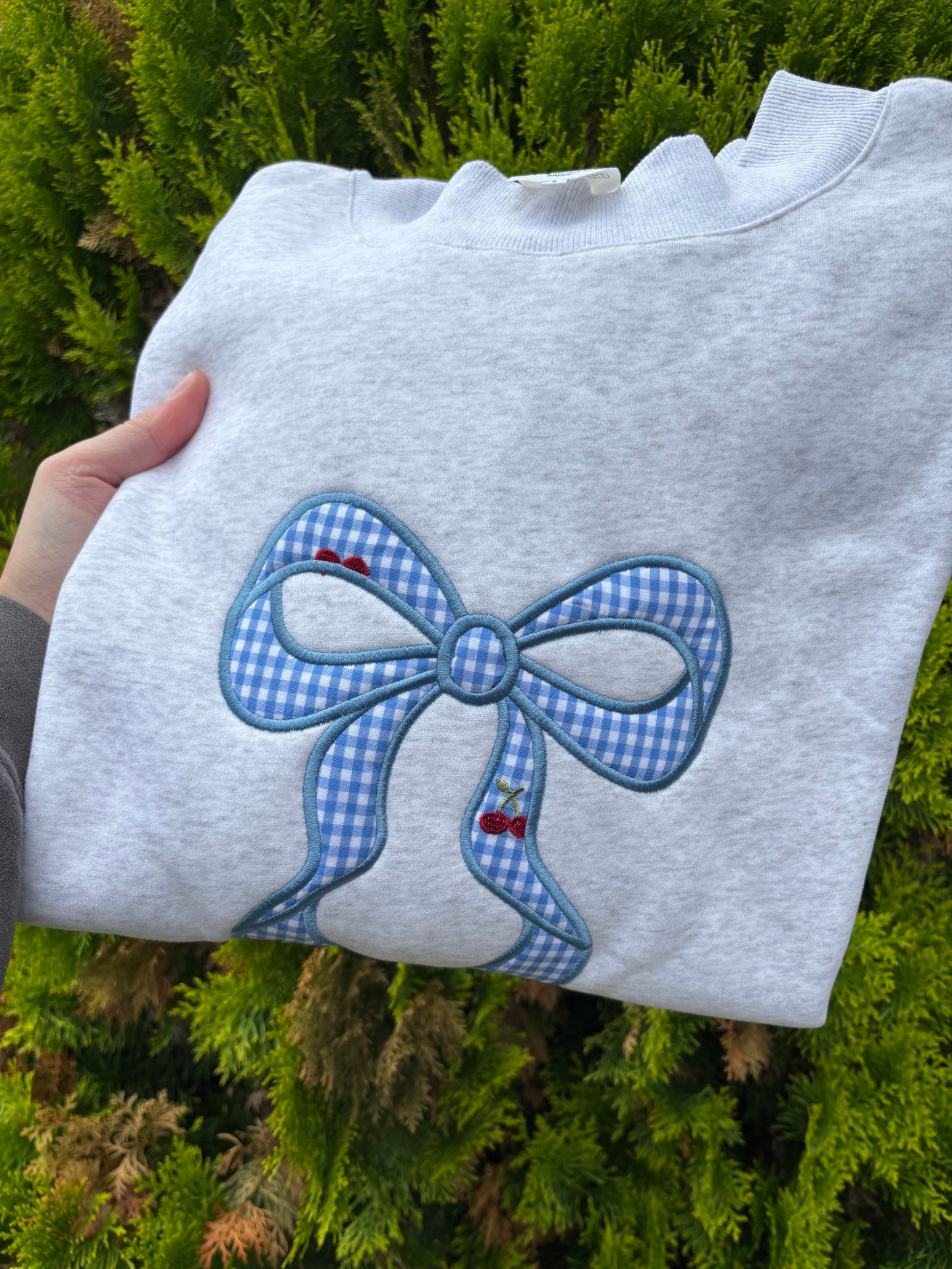 Blue bow mockneck