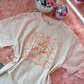 Cozy season collage tee