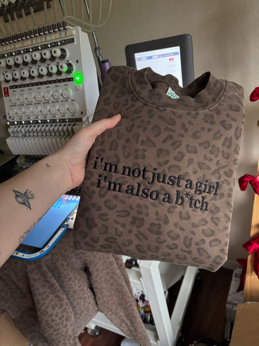 I’m not just a girl crewneck