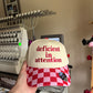 Deficient in attention checkered hat